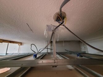ceiling rose above susp ceiling.jpg